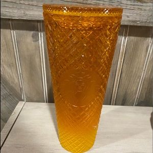 Orange Starbucks cup